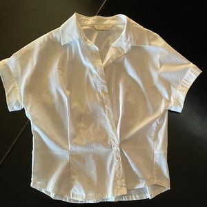 Very cute white shirt. Size 0.